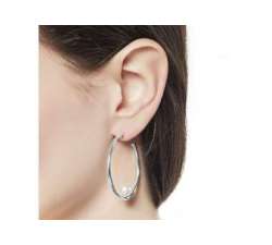 Girl with pearl hoops earrings Marianela_silver