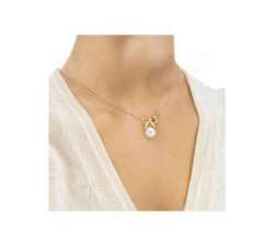 Girl with the Majorica pearl pendant with a silver chain Delta
